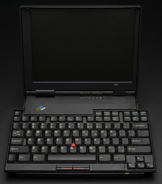 An IBM ThinkPad 701C, open, with its TrackWrite keyboard expanded